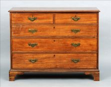 An early 19th century mahogany chest of drawers The moulded rectangular top above an arrangement