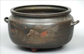 A 19th century Japanese bronze jardiniere The twin handles flanking incised mountainous scenes. 53