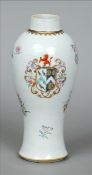 An 18th century Chinese porcelain famille rose vase Of slender bulbous form, decorated with floral