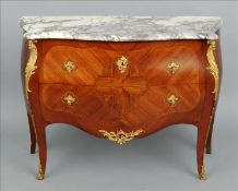 A pair of Louis XV style marble topped kingwood bombe commodes Each variegated marble top above
