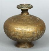 A 19th century Middle Eastern incised copper vase Of squat bulbous form, standing on a spreading