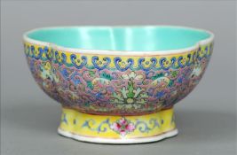 A Chinese porcelain polychrome decorated bowl Of trefoil shape, the underside with iron red Chia