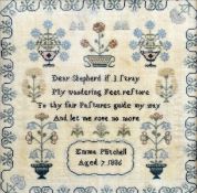 A 19th century needlework sampler by Emma Mitchell, Aged 7 and dated 1836 Worked with a verse within