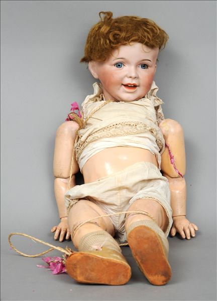 A late 19th century French bisque headed doll The reverse of the head stamped 21 SFBJ 23G Paris.