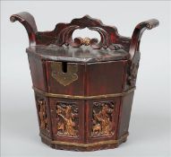 A brass mounted and carved Chinese well bucket The carved removable handle above the hexagonal lid