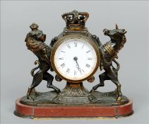 A Victorian bronze and rouge marble mantle clock Formed as the Royal coat-of-arms of the United