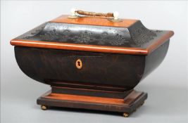 A Regency burr, yew and satinwood work box The mother-of-pearl loop handle carved as joined hands