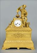 A 19th century ormolu mantel clock Mounted with a figure of a Chinaman holding a cup, leaning on a
