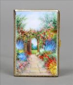 An unmarked gilt white metal enamel decorated cigarette case Decorated to the front with a floral