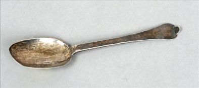 An unmarked silver trifid spoon, maker`s mark of GC The finial engraved EA EM. 19 cms long. Some