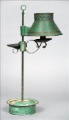 A 19th century tole ware bouillotte lamp Painted green throughout with gilt detailing and with