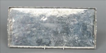 A Chinese unmarked white metal tray The rectangular galleried body with twin carrying handles,