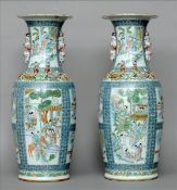 A pair of large 19th century Chinese porcelain baluster vases Each decorated with figural