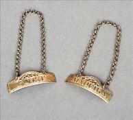 A pair of George III silver decanter labels, each with maker`s mark of Hester Bateman One