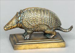 A 19th century Continental bronze inkwell Formed as an armadillo naturalistically modelled, the
