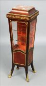 A late 19th century French marble and gilt metal mounted rosewood vitrine The marble mounted top