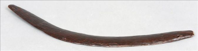 A late 19th/early 20th century Aboriginal boomerang Of typical form, with allover adzed