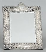 An Edwardian silver mounted dressing table mirror, hallmarked London 1903, maker`s mark of G & S Co.