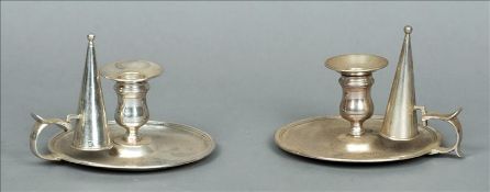 A pair of George III silver chambersticks, the sticks probably hallmarked London 1762, maker`s