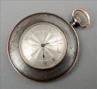 A late 19th/early 20th century unmarked gold and polished steel pocket watch The engine turned