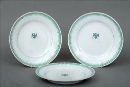 A 19th century Continental part dinner service, probably Limoges The white ground bodies centred