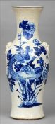 A 19th century Chinese blue and white vase The flared neck above twin mask and loop handles, the