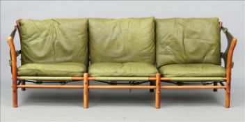 ARNE NORELL (1917-1971) Swedish, for M”bel AB Arne Norell A rosewood framed Safari Settee;