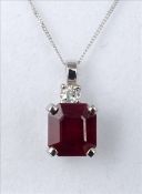 A ruby and diamond pendant The claw set ruby approximately 3.5 carats, in an unmarked 18 ct white