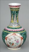 A Chinese porcelain vase The body decorated with figural and animal vignettes within lotus