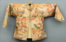 A late 19th/early 20th century jacket Tailored from a Japanese kimono, the lining astrakhan.