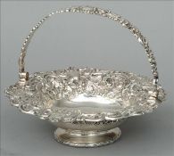 A George IV embossed silver basket, possibly hallmarked Sheffield 1833, maker`s mark of RG The