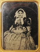 A 19th century Ambrotype photographic portrait Within a gilt slip and moulded frame. 11 x 12.5 cms