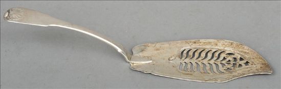 A George III silver Fiddle and Shell pattern fish slice, hallmarked London 1779, maker`s mark of