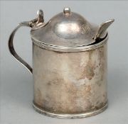 A George III silver mustard pot, hallmarked London 1793, maker`s mark of AF The domed finial mounted