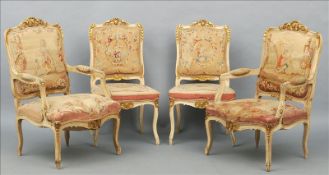 A suite of late 19th century Louis XV style chairs Comprising: two open armchairs and two single