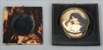A 19th century miniature on ivory Depicting a mother and child, signed Kaulbach, in a pressed