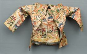 A late 19th/early 20th century jacket Tailored from a Japanese kimono; together with a short sleeved