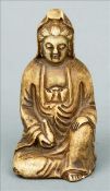 A Chinese carved hardstone figure of Guanyin Modelled seated holding a flask. 7.5 cms high. Slight