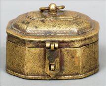 A Middle Eastern bronze casket The hinged domed lid with loop handle and a latch with allover