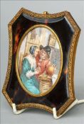 A 19th century Continental portrait miniature on ivory Depicting a gentleman and a young lady in a