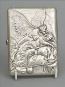 A Russian silver cigarette case, marked to the interior 84. Decorated to one side with an angel