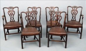 A set of six Chippendale Revival mahogany dining chairs, including two with arms The serpentine