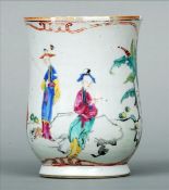 An 18th/19th century Chinese Export mug Of waisted baluster form with a loop handle, decorated