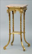 A 19th century marble topped gilt brass jardiniere stand The square marble top above a pierced