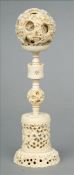 A 19th/20th century Chinese carved ivory puzzle ball and stand Typically carved. 28.5 cms high