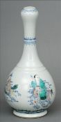 A Chinese porcelain onion vase Decorated with various immortals riding mythical beasts above
