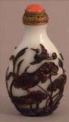 A Chinese carved cameo glass snuff bottle Decorated to one side with two mandarin ducks. 7.5 cms