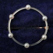 A pearl necklace Set with an 18 ct gold clasp; a white gold and pearl ring, mark`s indistinct; and