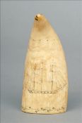 A scrimshawed whale`s tooth Decorated to one side with a three masted ship with a band of foliate