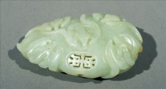 A Chinese carved jade pendant Modelled as bats. 7 cms long. Generally in good condition, expected